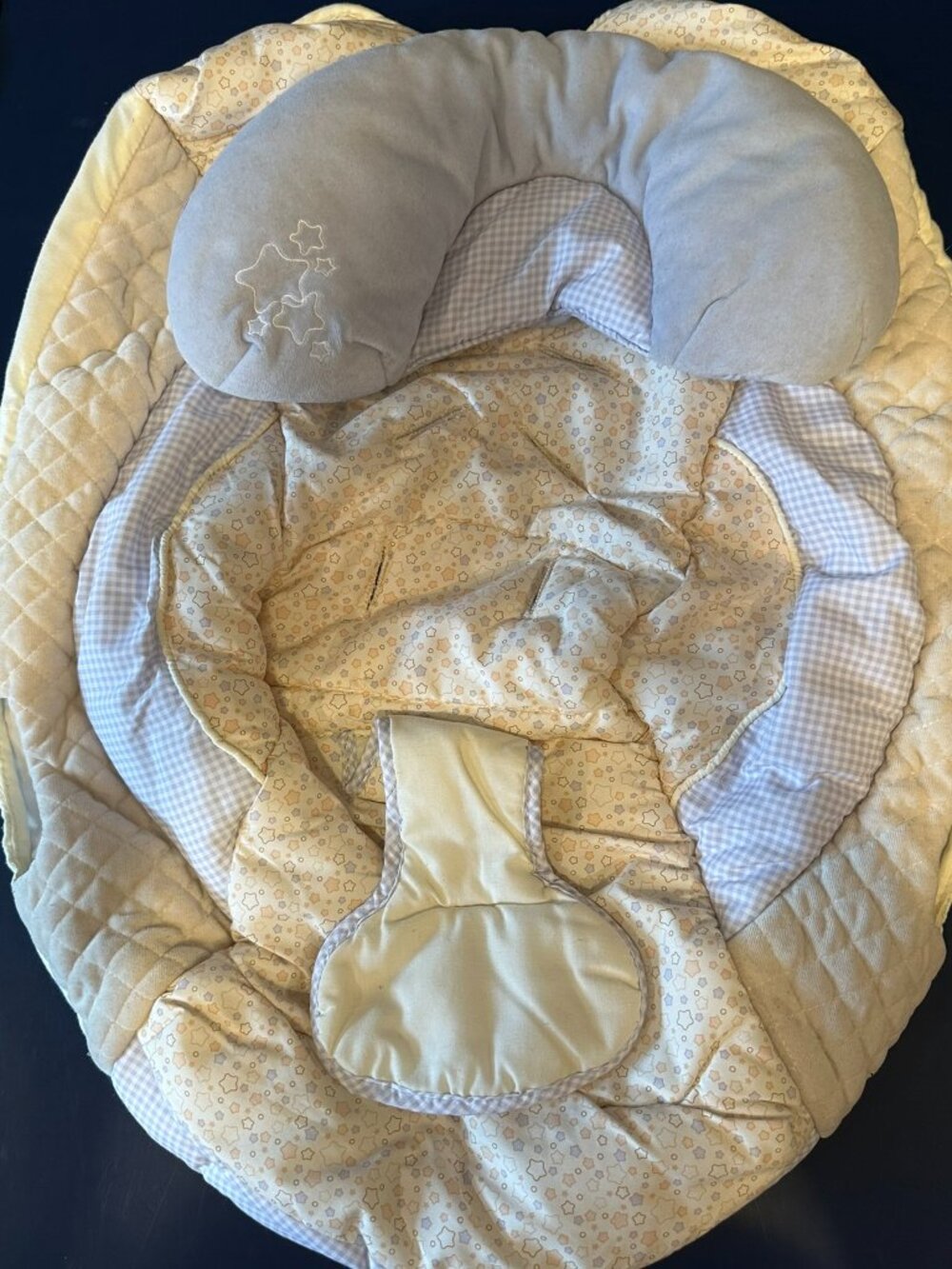 Quilted replacement cover for a Fisher-Price baby bouncer.